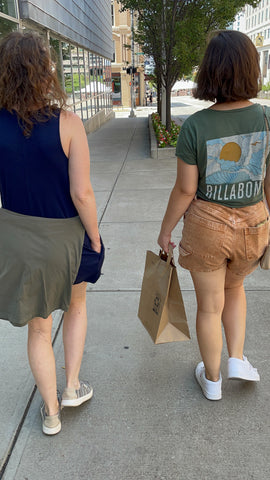 back of women shopping in grand rapids michigan