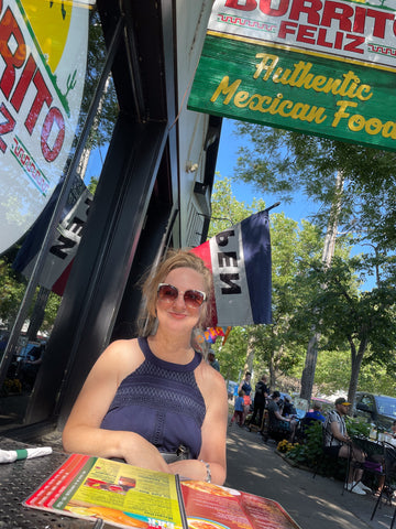 girl in front of burrito restaurant in saugutuck