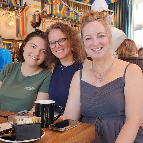 three woman at restaurant