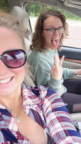 jodi driving her sister in a car