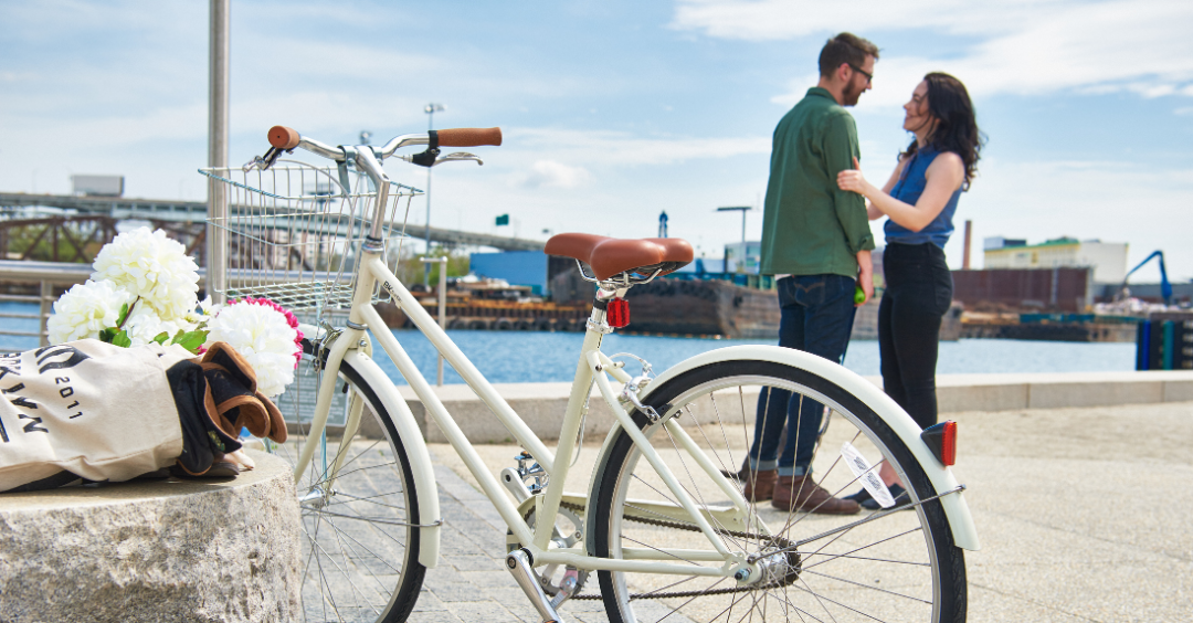 Happy couple with their Brooklyn bike