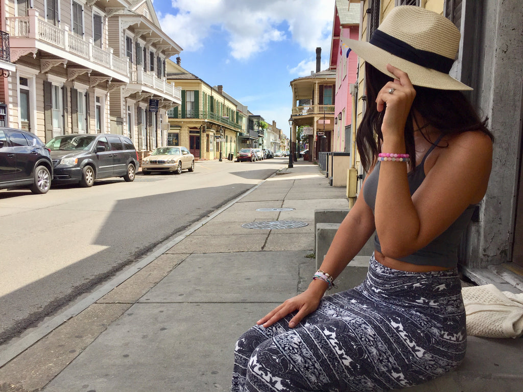 New Orleans Bourbon Street girl wearing Charming Shark Jewelry