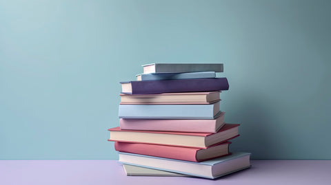 A stack of books against a blue and purple background