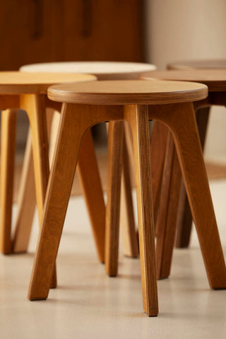 small wooden stools in different color