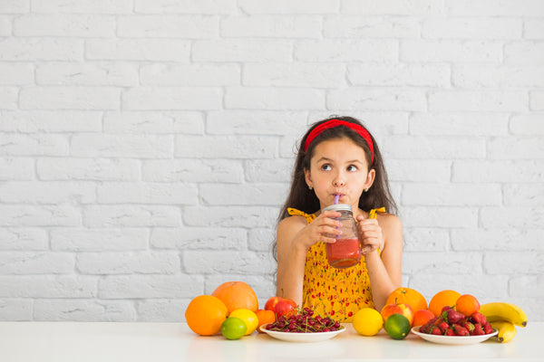 kid drinking Smoothie