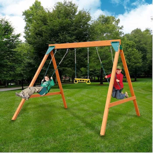 Two kids on a wooden swing set.