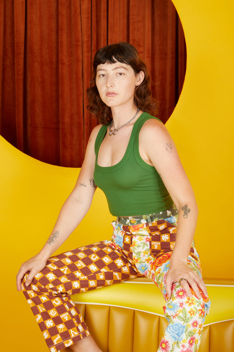 Alexandra Skye is wearing Cropped Tank Top in Lawn Green and Mismatched Print Work Pants