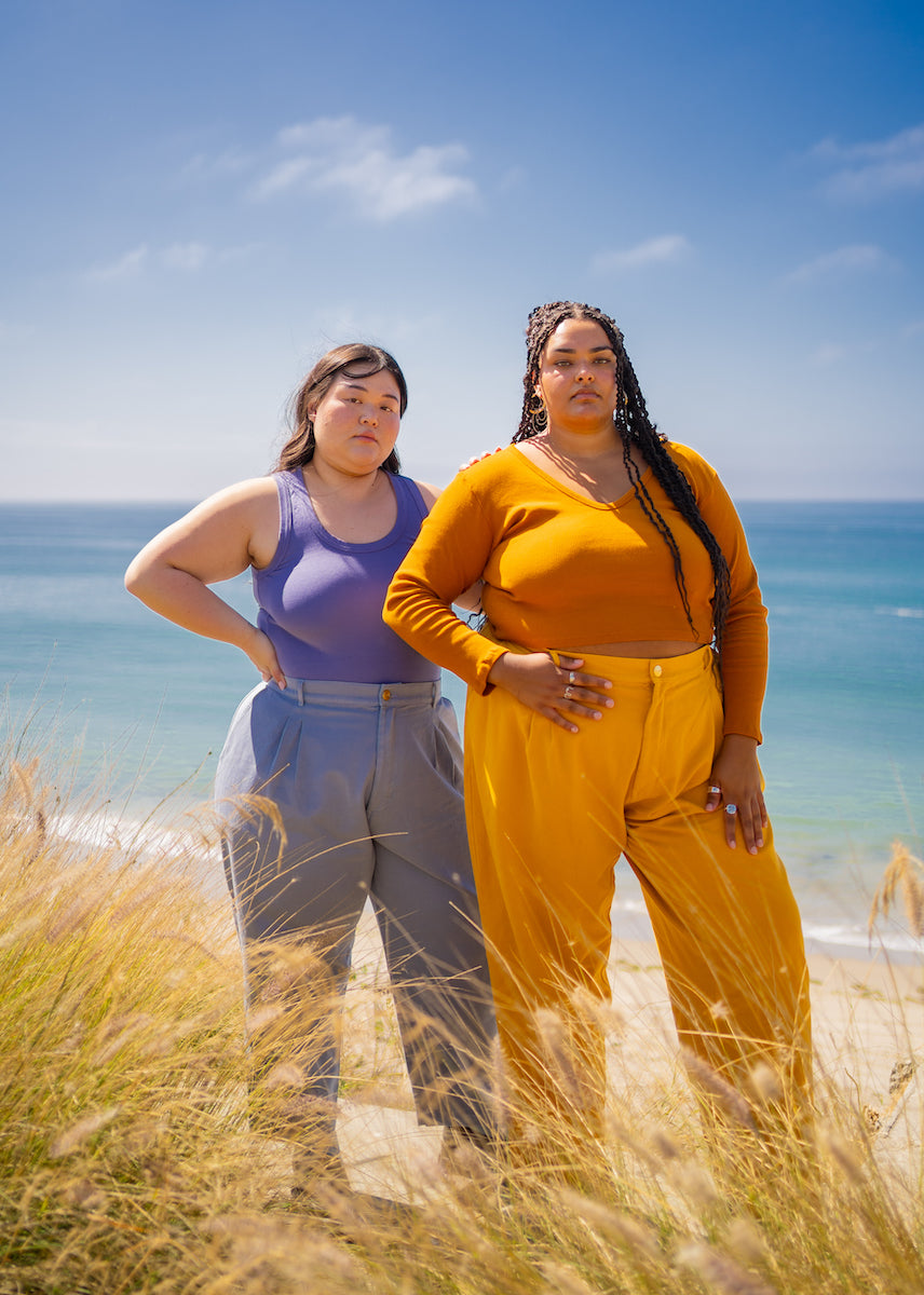 Ashley and Alicia are wearing Organic Trousers in Periwinkle and Spicy Mustard