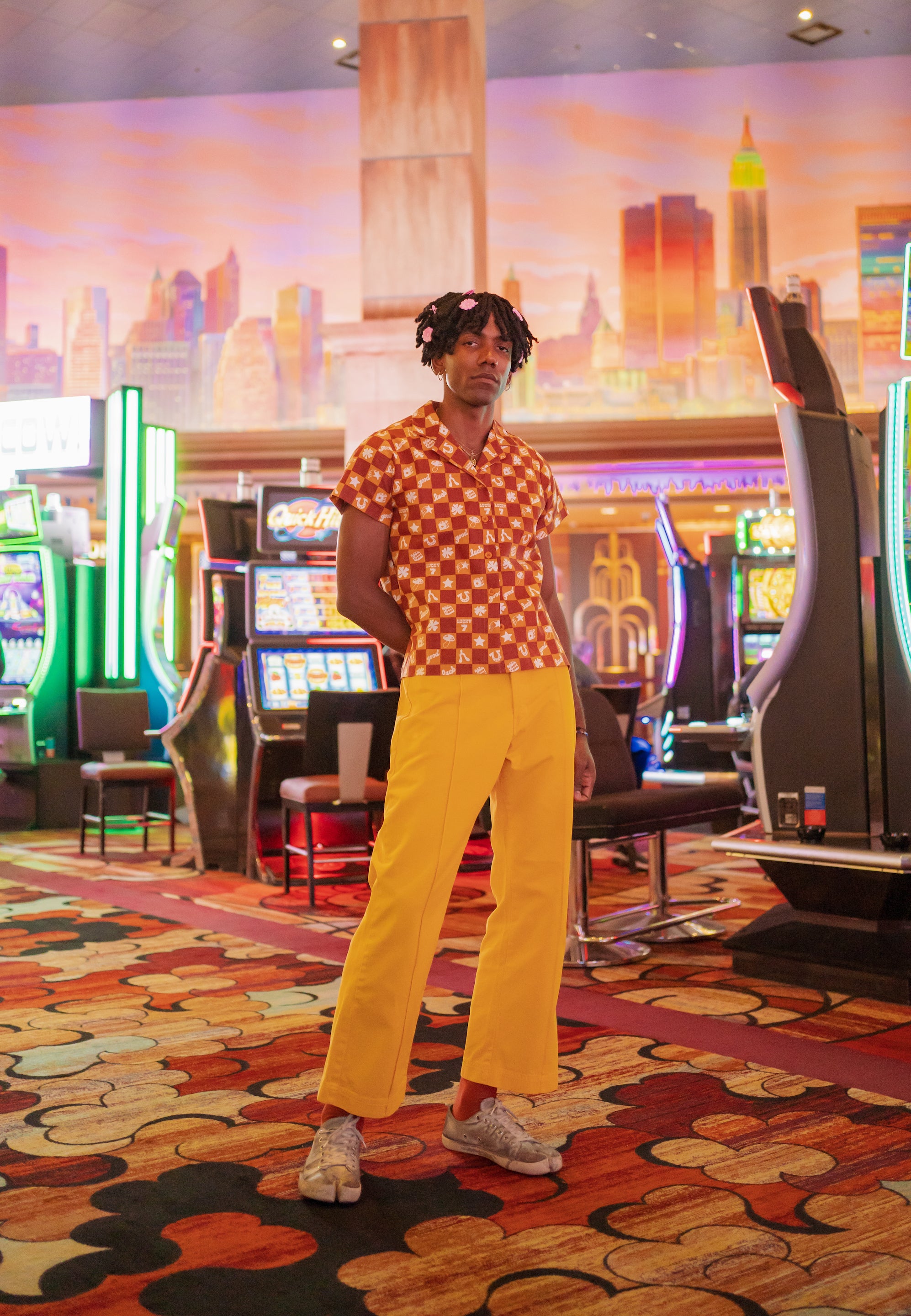Jerrod in casino wearing Pantry Button-Up in Spicy Mustard and Western Pants in Sunshine Yellow