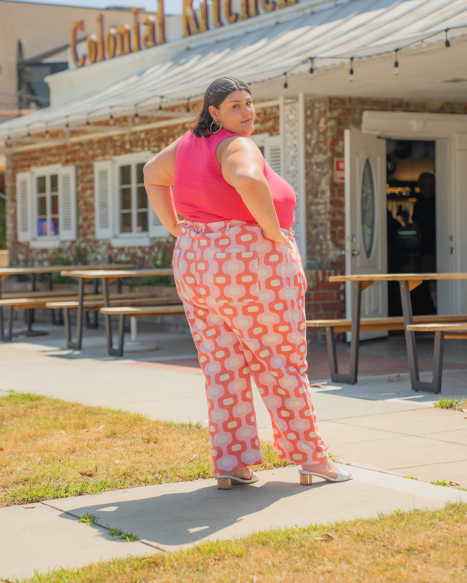 Sarita is wearing Tank Top in Hot Pink and Wester Pants in Pink Jacquard