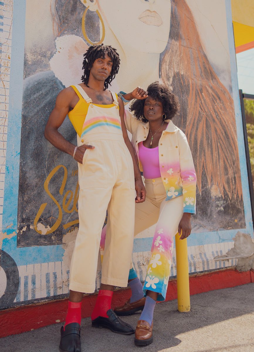Reece is wearing  Work Jacket in Butterfly Airbrush and matching Butterfly Airbrush Western Pants. Jerrod is wearing Rainbow Overalls and Cropped Cami in Sunshine Yellow