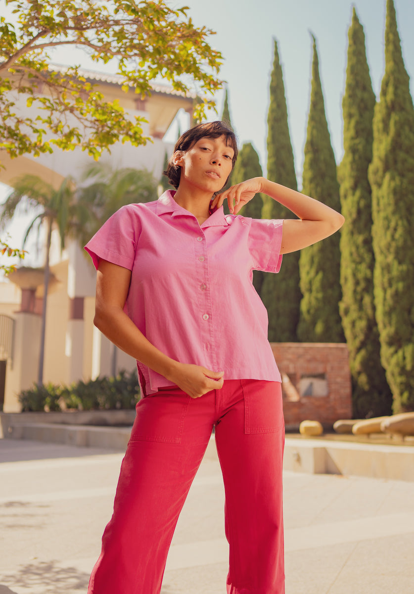 Tiara is wearing Pantry Button Up in Bubblegum Pink and Work Pants in Hot Pink