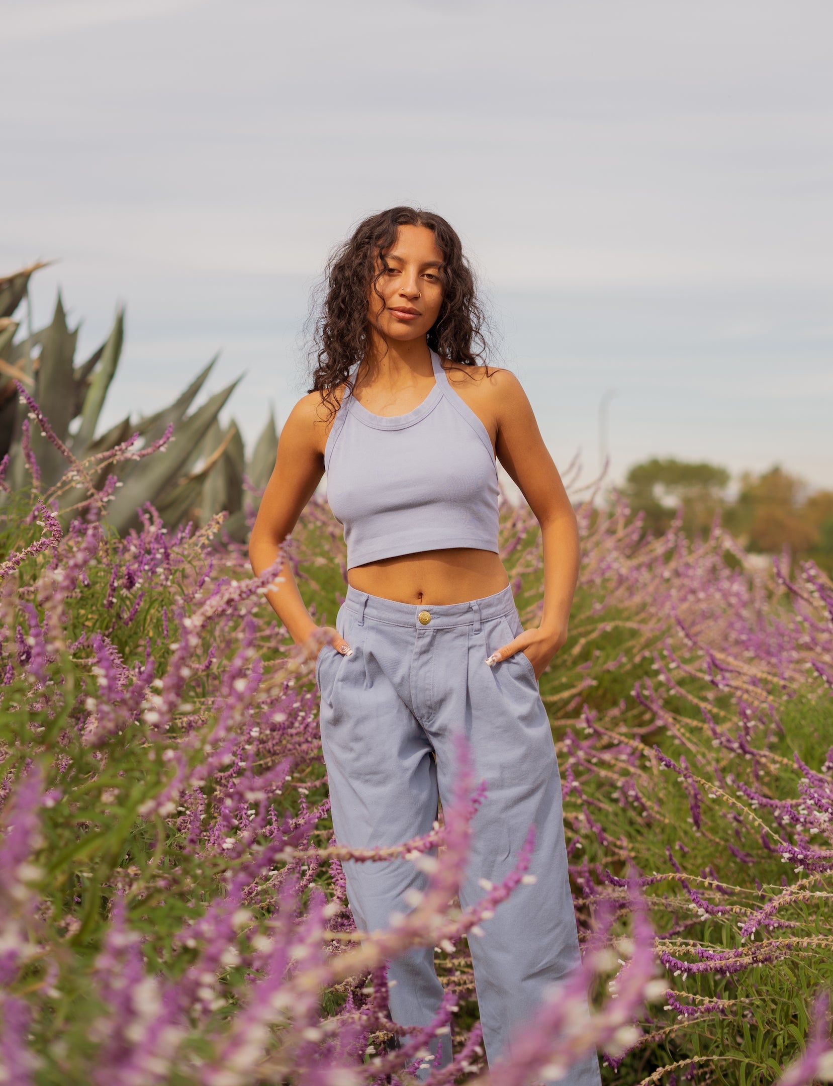 Blair is wearing Halter Top in Periwinkle and Heavyweight Trousers in Periwinkle