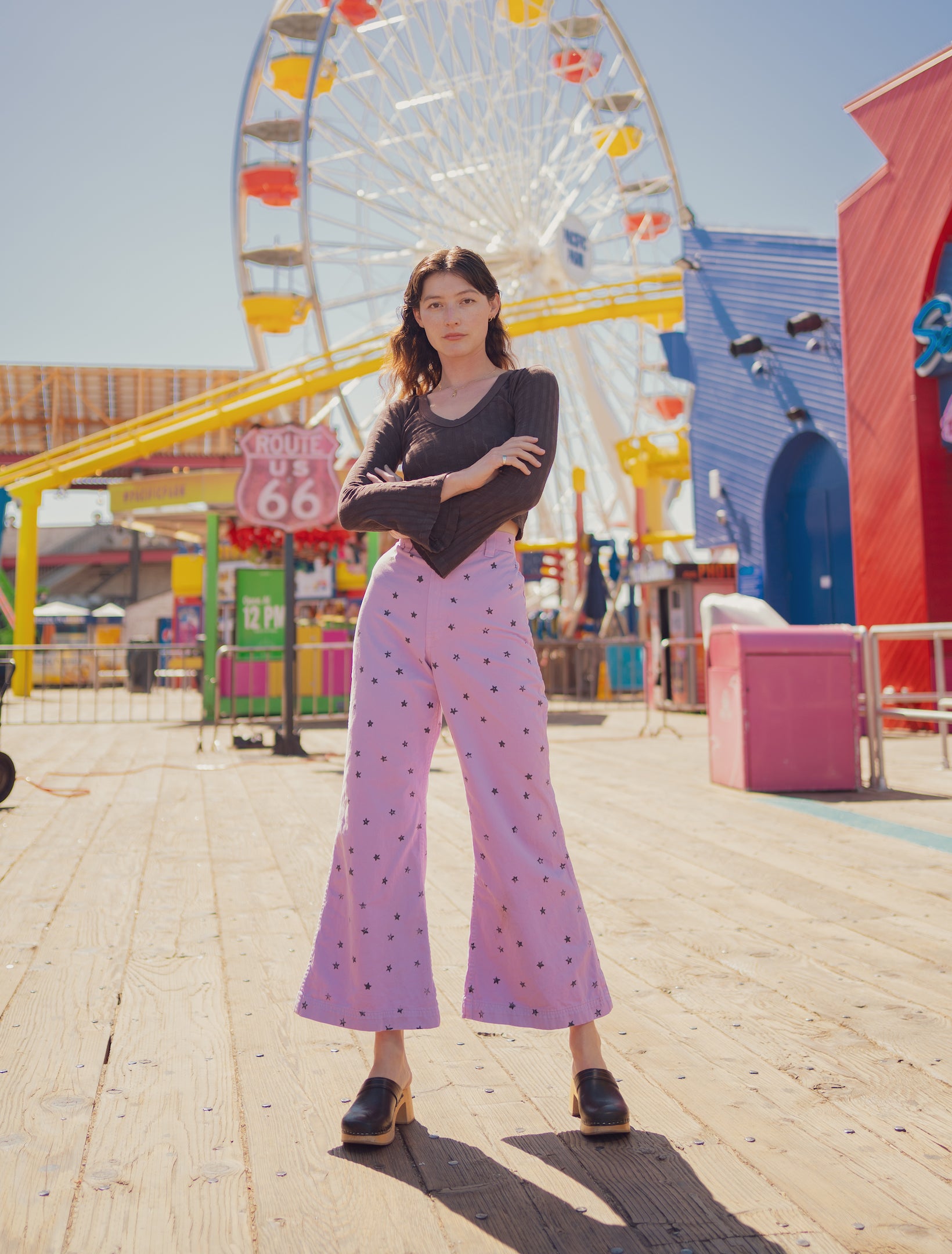 Alexandra Skye is wearing Star Bell Bottoms in Lilac Purple and Bell Sleeve Top in Espresso Brown