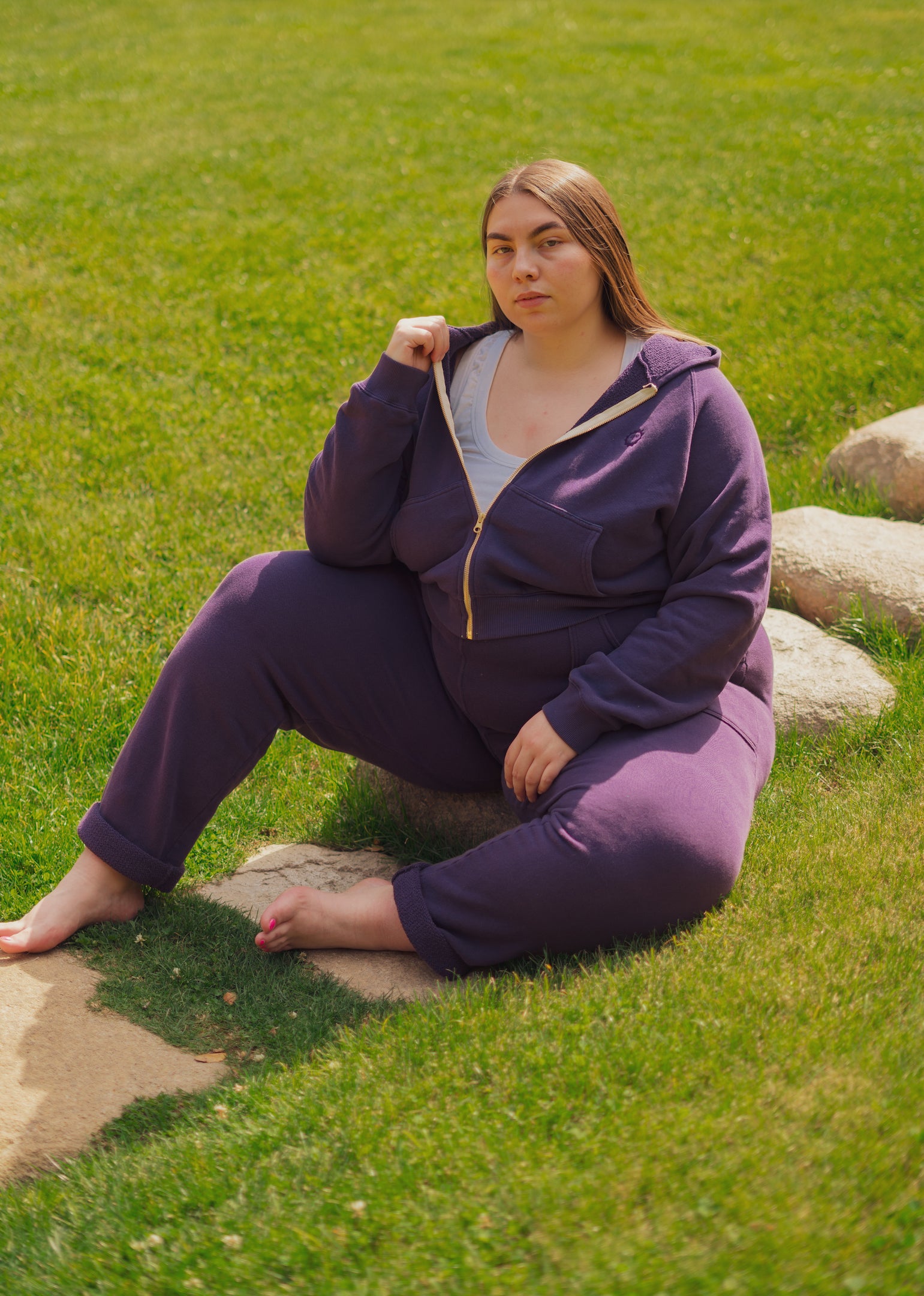 Marielena is wearing Cropped Zip Hoodie in Nebula Purple and matching Rolled Cuff Sweat Pants