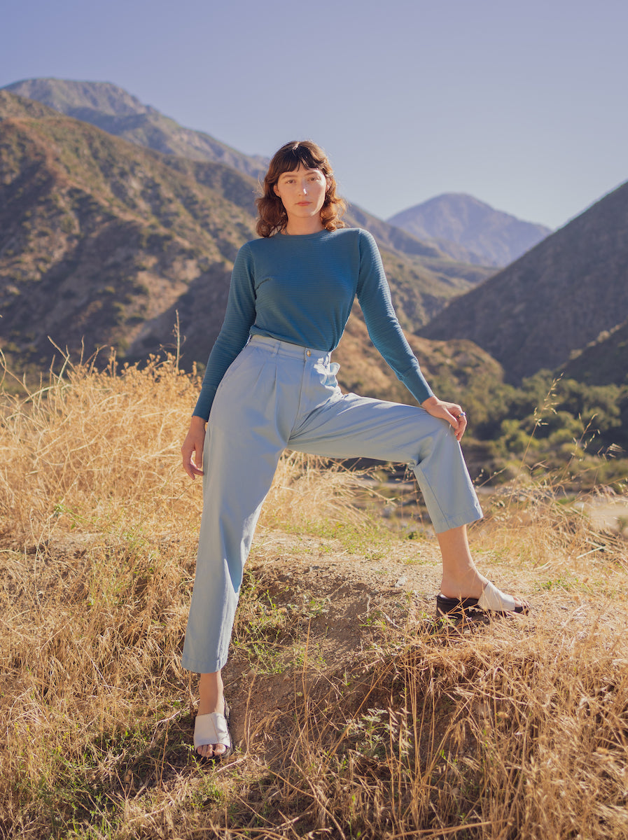 Alexandra Skye is wearing Honeycomb Thermal in Marine Blue and Organic Trousers in Periwinkle