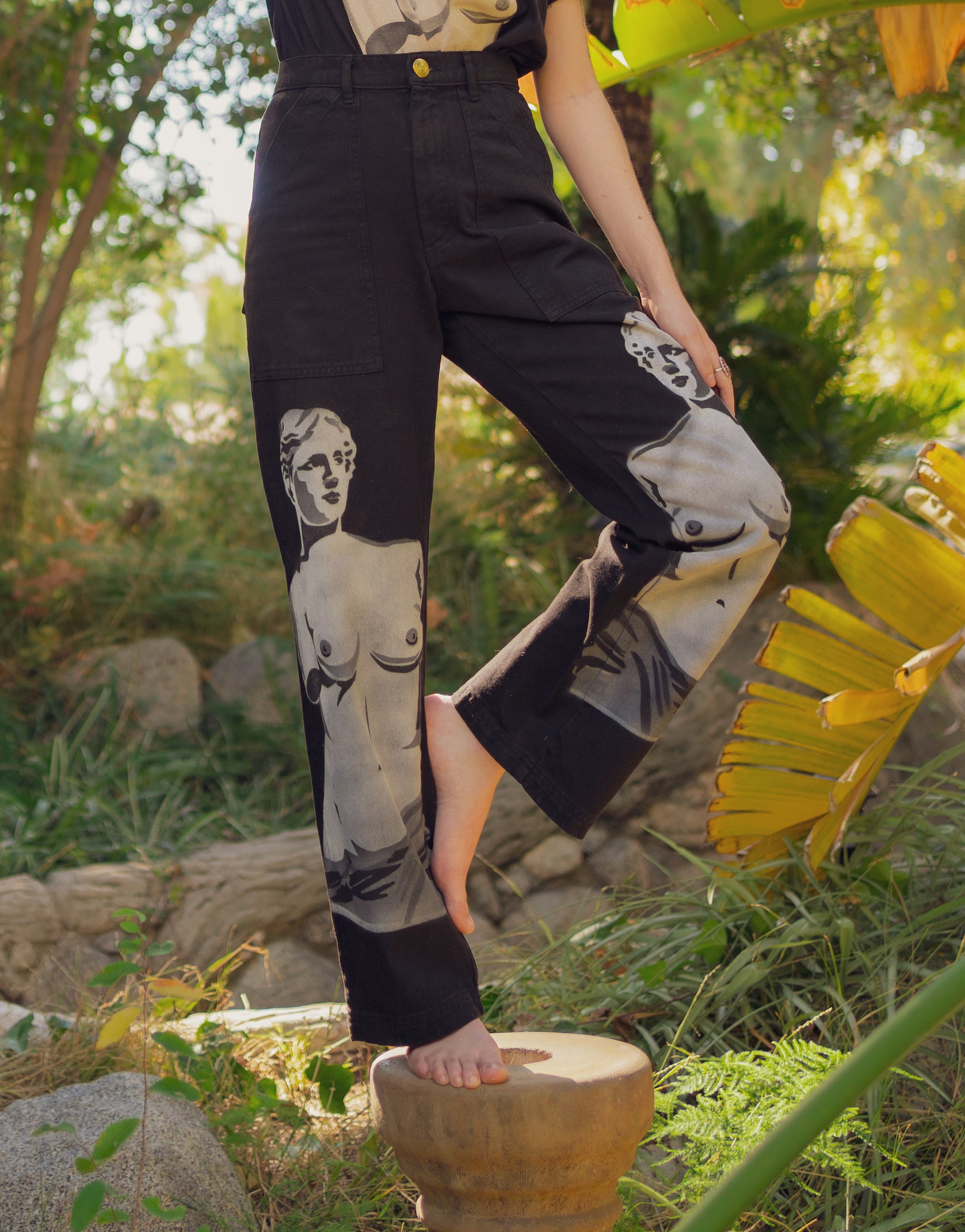 Rene Ferry is wearing Black Venus Organic Tee and Black Venus Work Pants