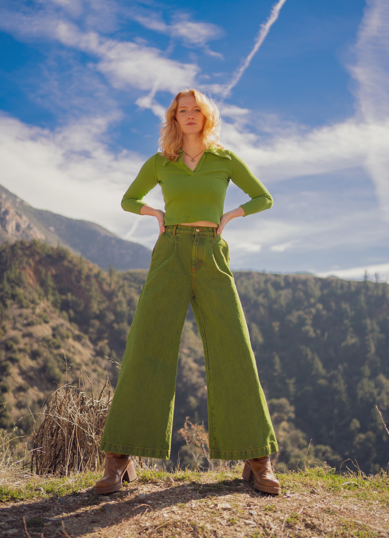Margaret is wearing Long Sleeve Fisherman Polo in Bright Olive and Wide Leg Trouser Jeans in Gross Green