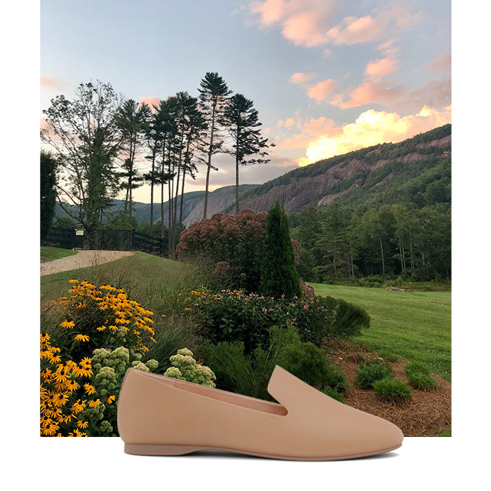 photo of mountains and beige flats