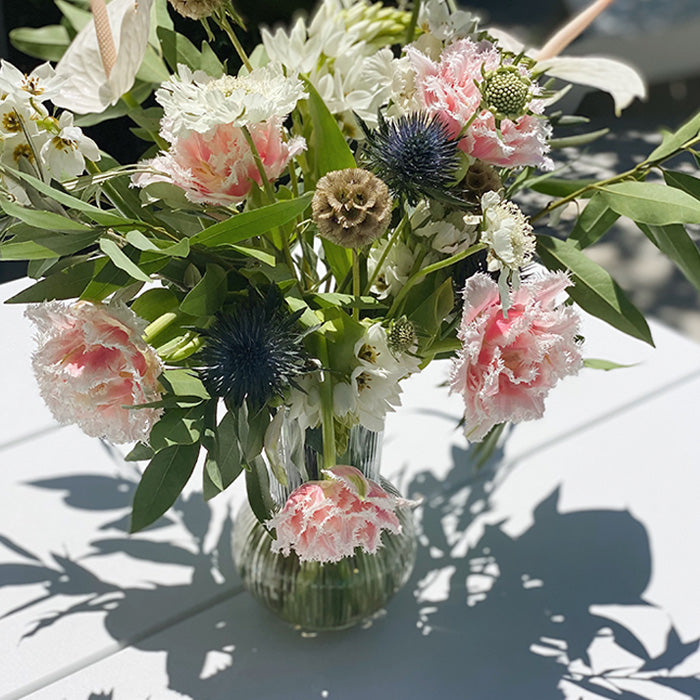 arrangement of white and pink flowers