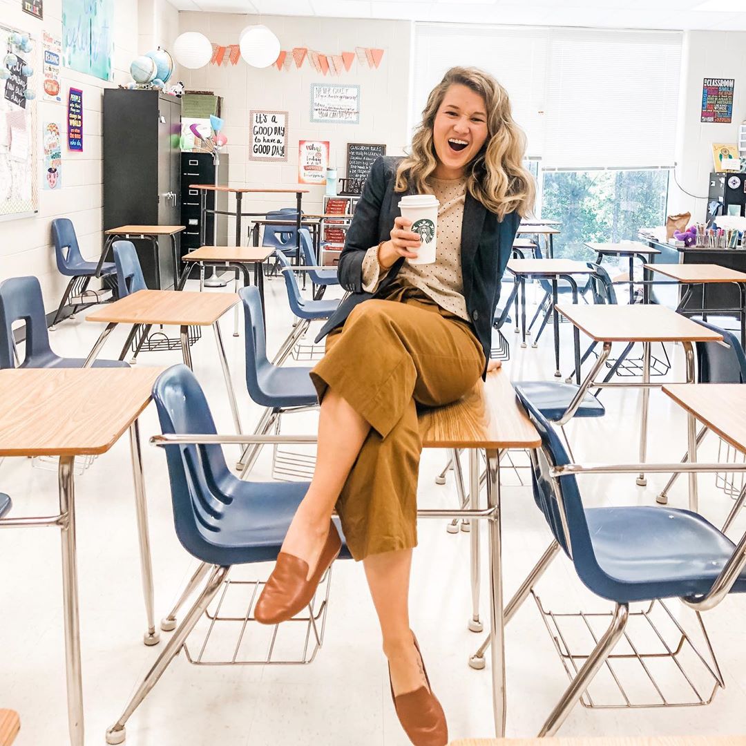 teacher in classroom wearing cognac leather flats