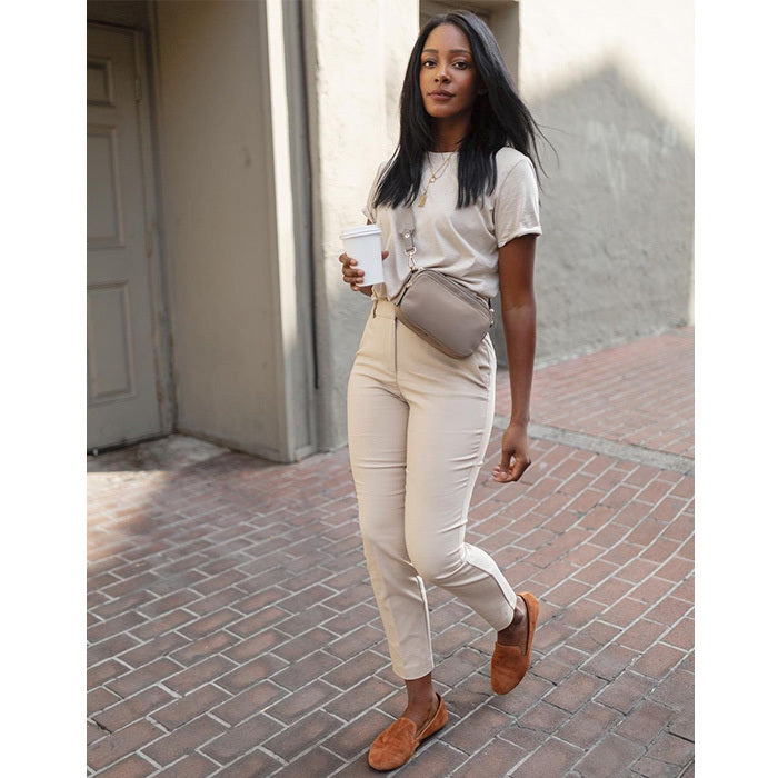 woman wearing shades of cream and chestnut brown flats