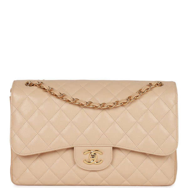 Chanel Beige Quilted Caviar Jumbo Classic Double Flap Bag – Madison Avenue  Couture