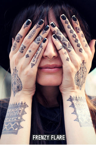 Ornamental finger tattoos