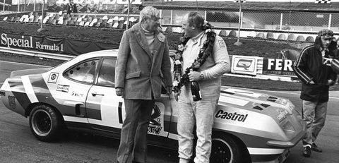 Gerry Marshall poses after winning a race in touring cars