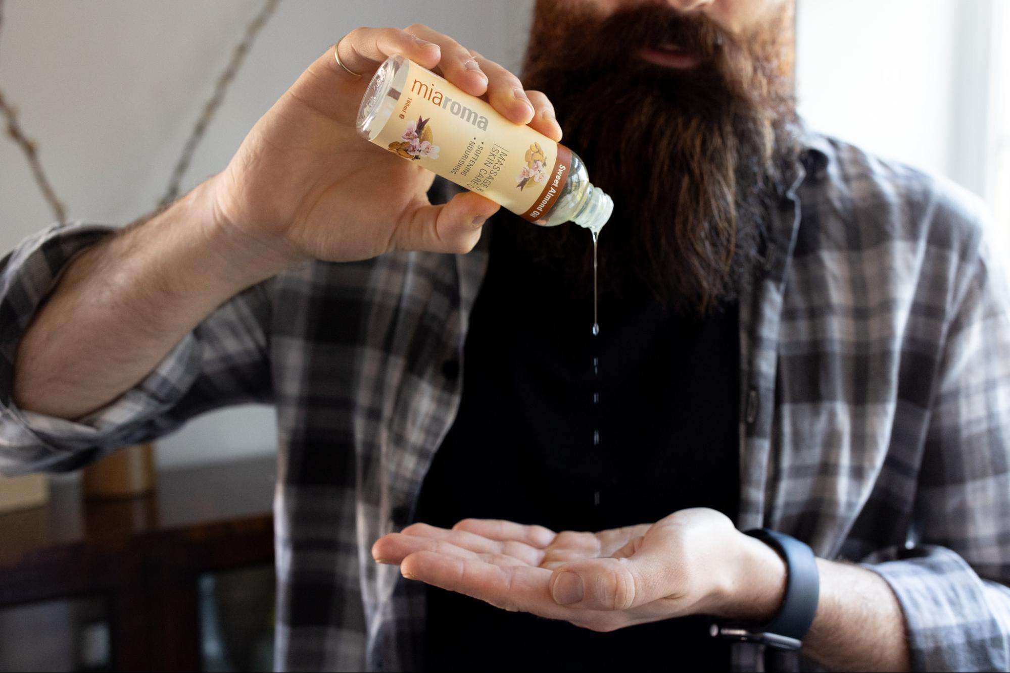 natural beard oil being applied