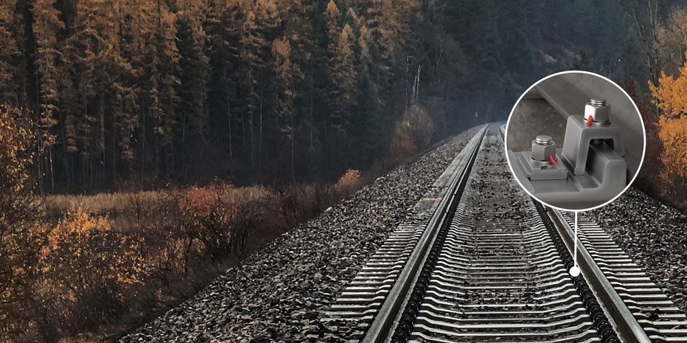 A rail line secured with screw locking varnish to create a tamper proof screw