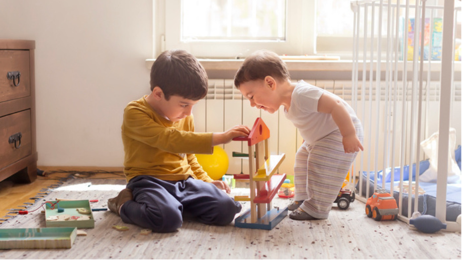 two toddlers playing