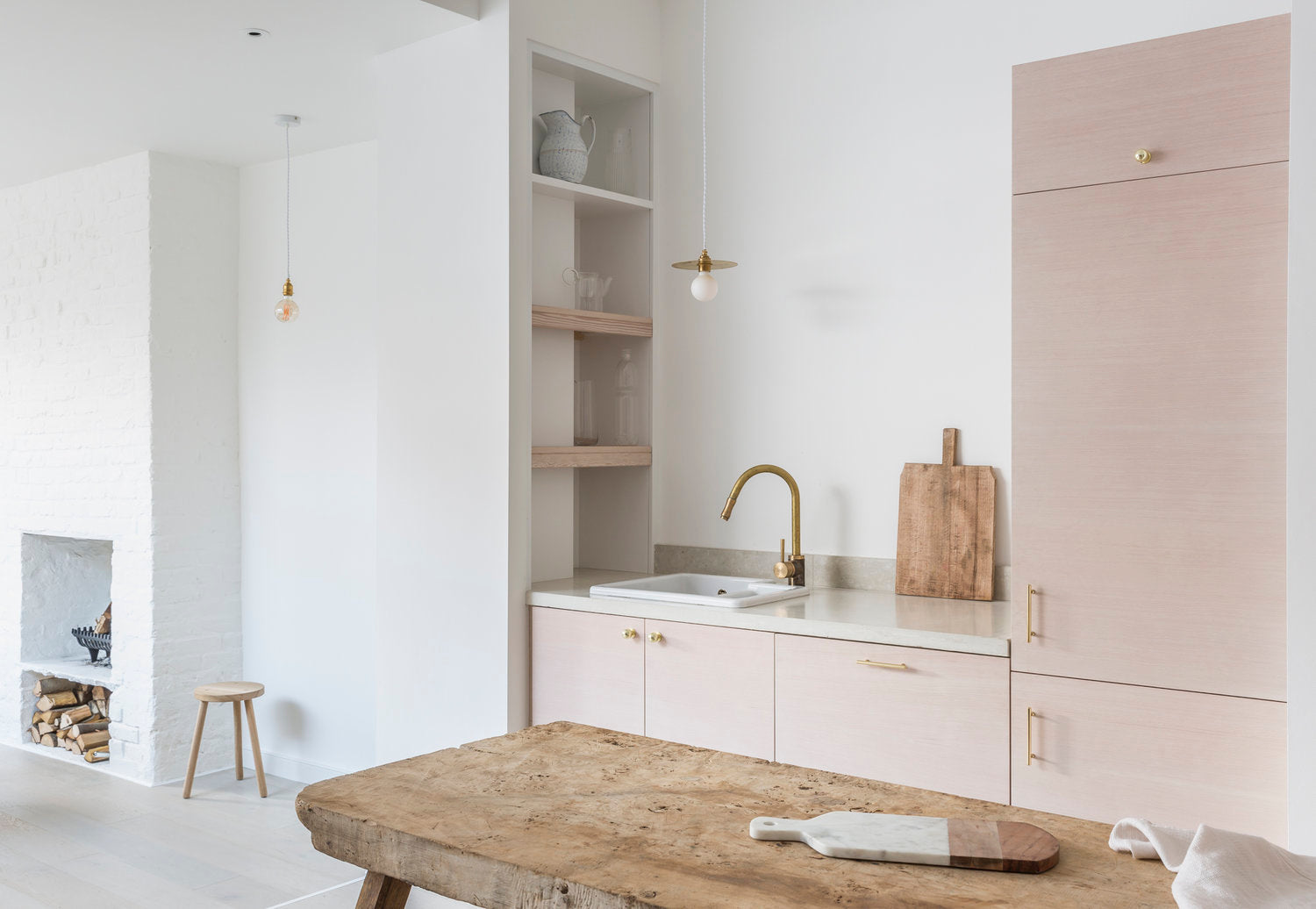 Pink and white and brass kitchen design