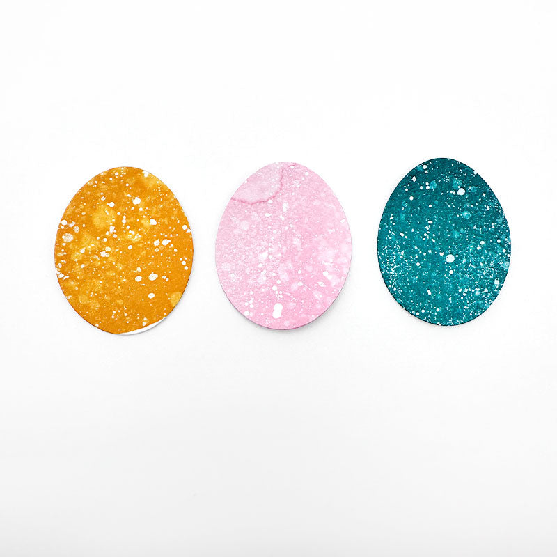 Make your own easter eggs and add some paint splatter!