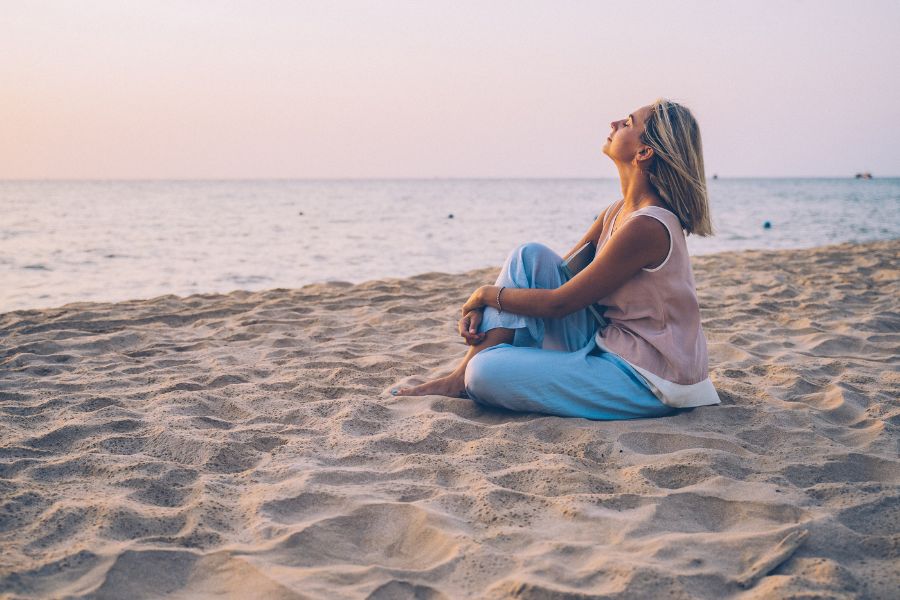 mindfulness and relaxation on the beach for vertigo relief