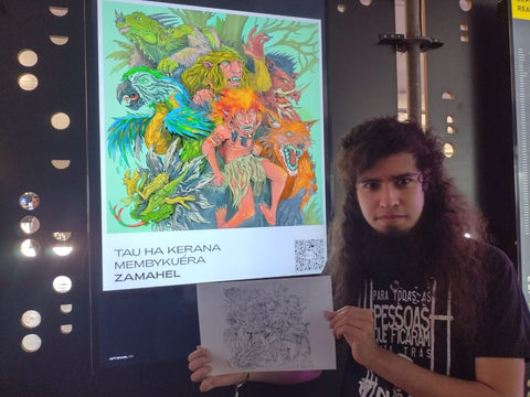 Zamahel with his artwork at exhibition
