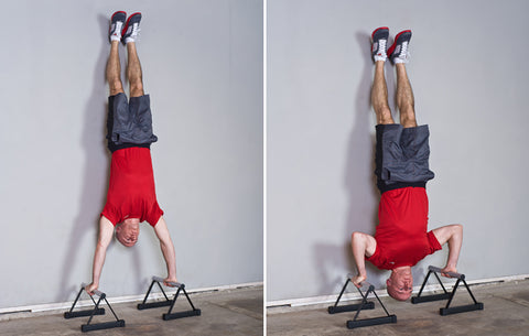 Handstand on a Parallette against the Wall