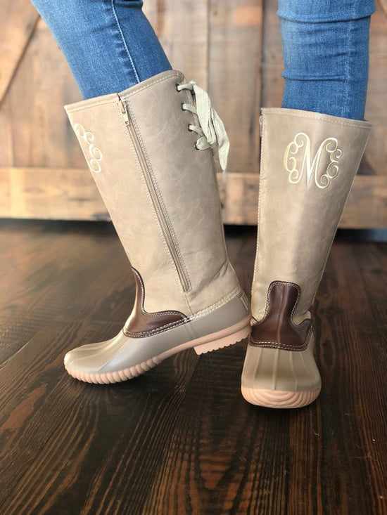 tall duck boots with monogram