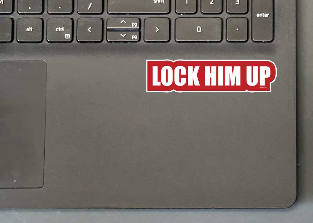 LOCK HIM UP MINI STICKER ON LAPTOP