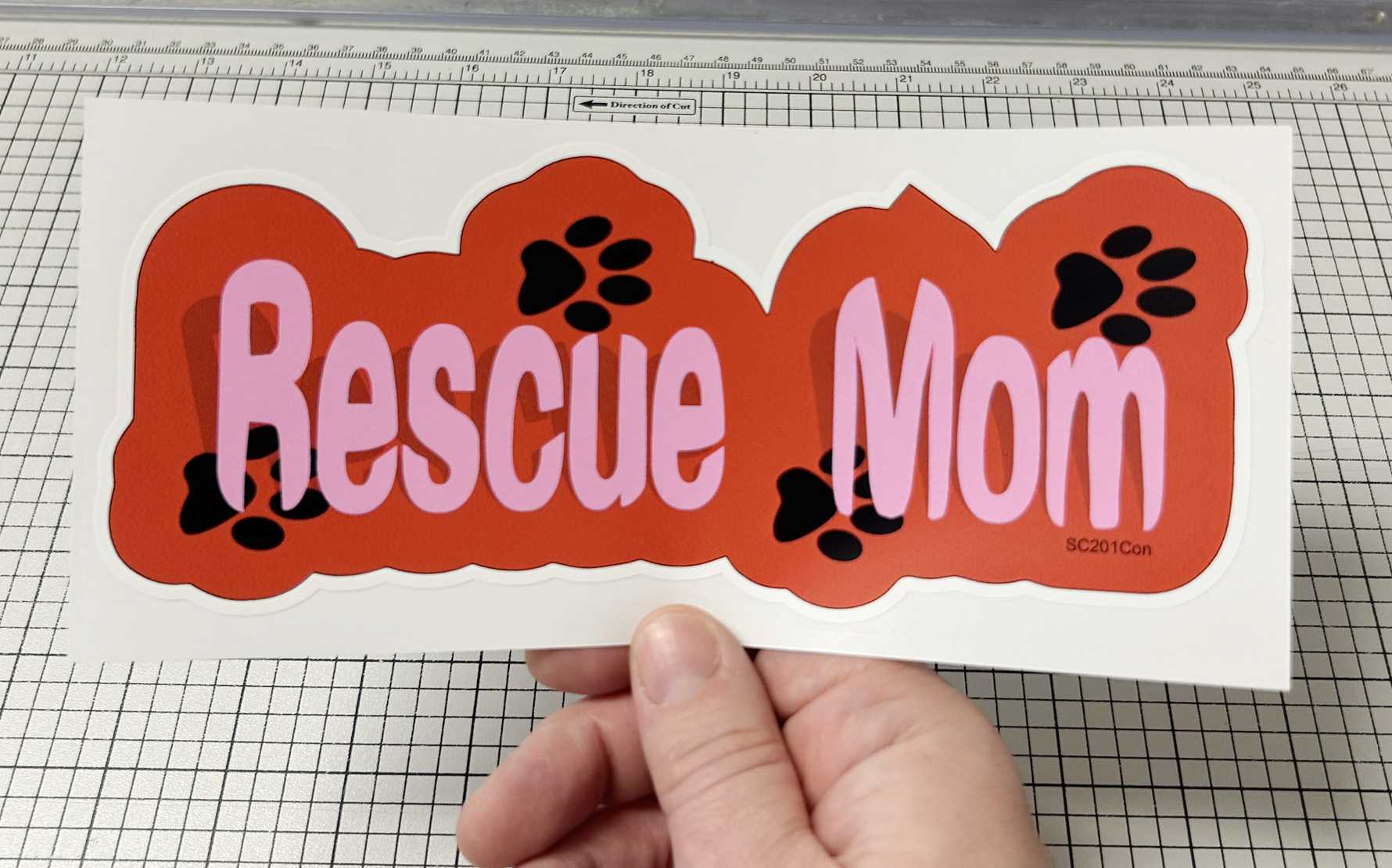 RESCUE MOM - CONTOURED DOG BUMPER STICKER IN HAND