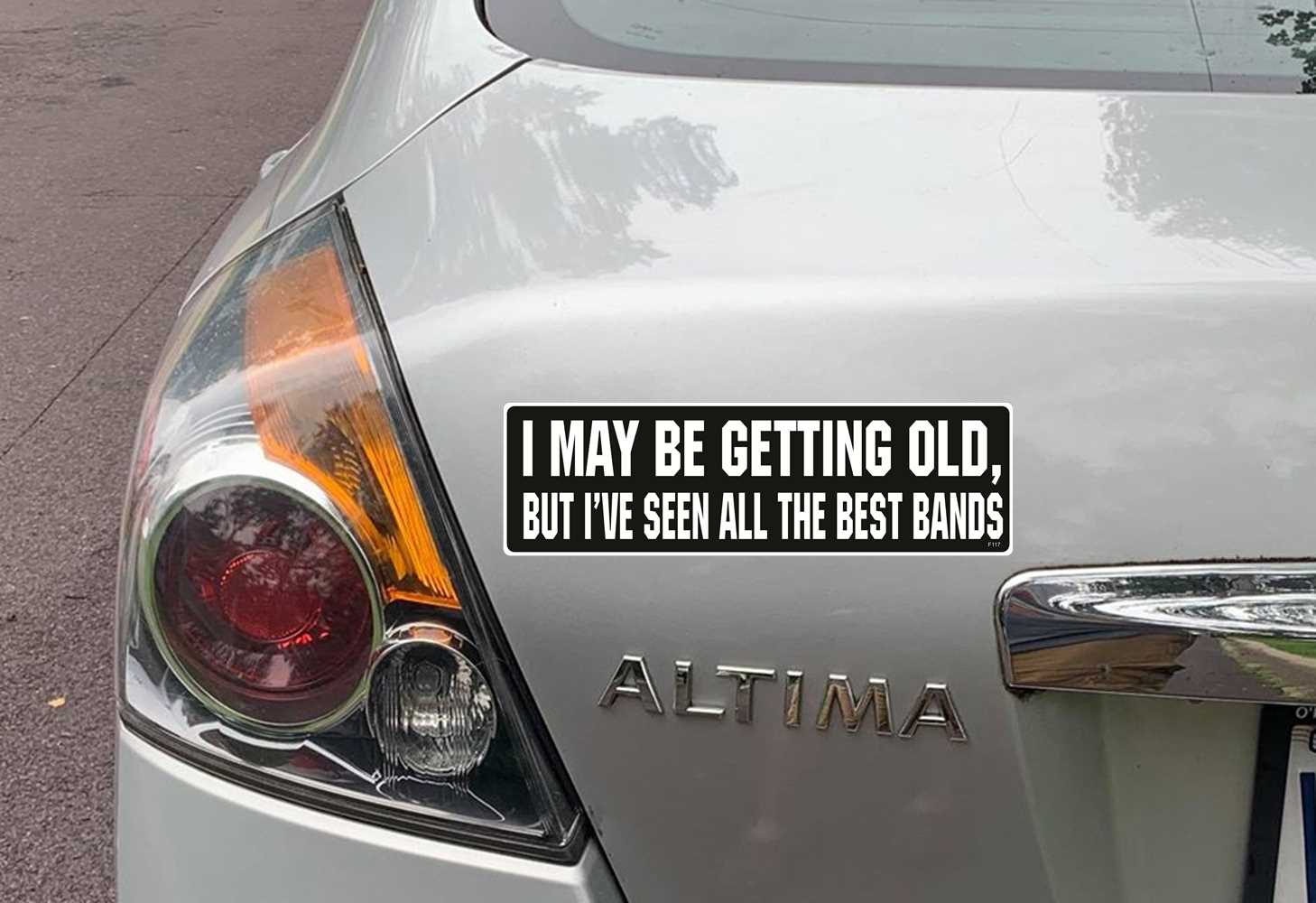 bumper sticker on car