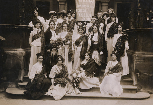 Suffragettes with tartan sash