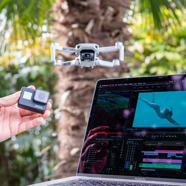 GoPro, drone, and Mac with video editing software