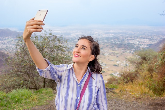 Woman taking content on iPhone