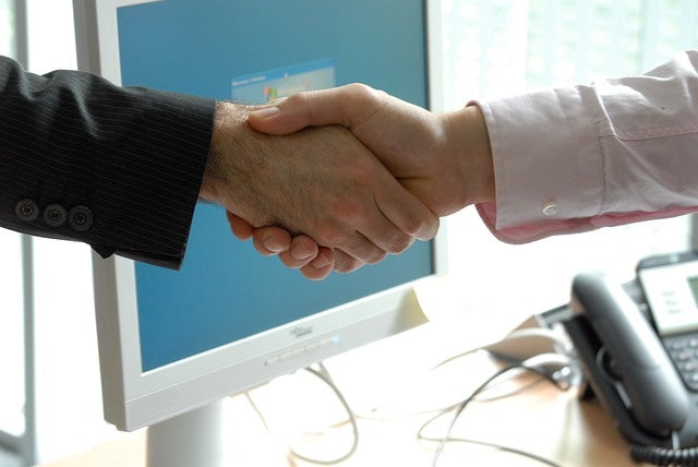 Business solidified by handshake