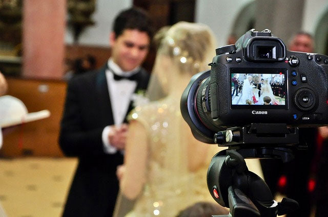 Camera filming wedding