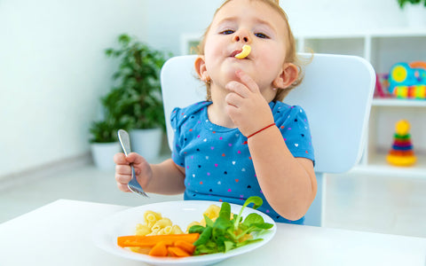 The Top 6 Questions About Introducing Solid Food To Baby
