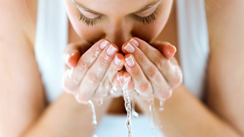 washing face acne