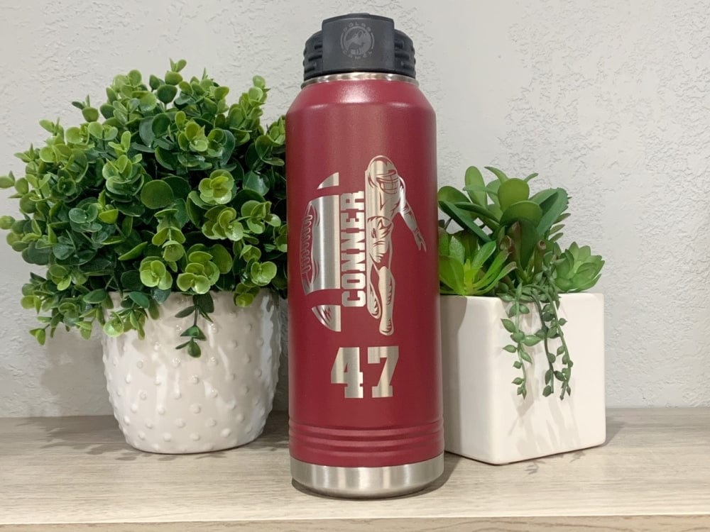 https://cdn.shopify.com/s/files/1/0777/8633/products/engraving-32-oz-football-name-number-football-32oz-water-bottle-engraved-with-name-and-football-number-34540047925415.jpg?v=1681039806