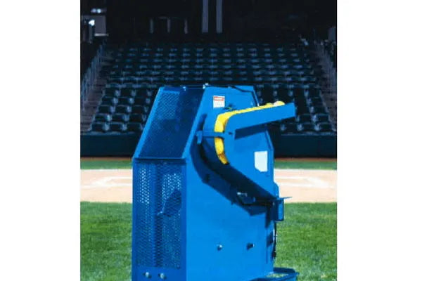 Iron Mike C-82 Pitching Machine designed for kids, featuring a durable blue frame and adjustable pitch settings on a baseball field.